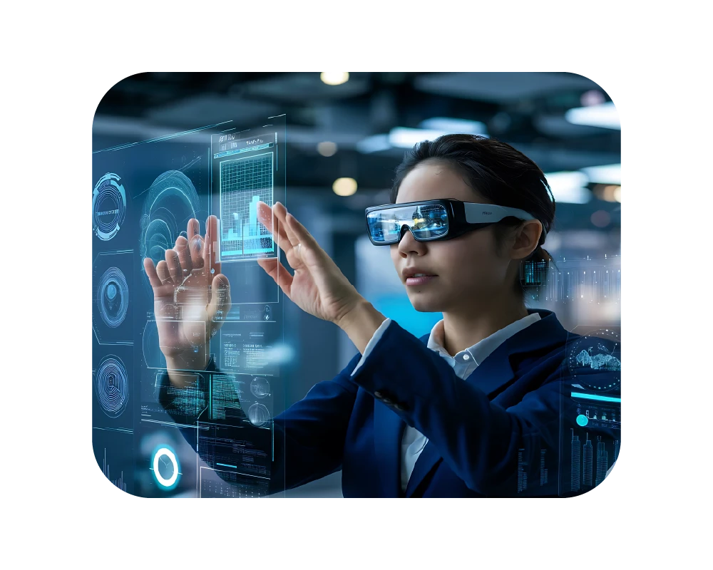 A woman wearing sleek smart glasses interacts with floating, holographic data interfaces and blue digital charts in a futuristic office setting.